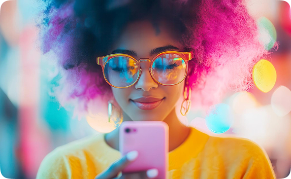 Graduate using TikTok on smartphone